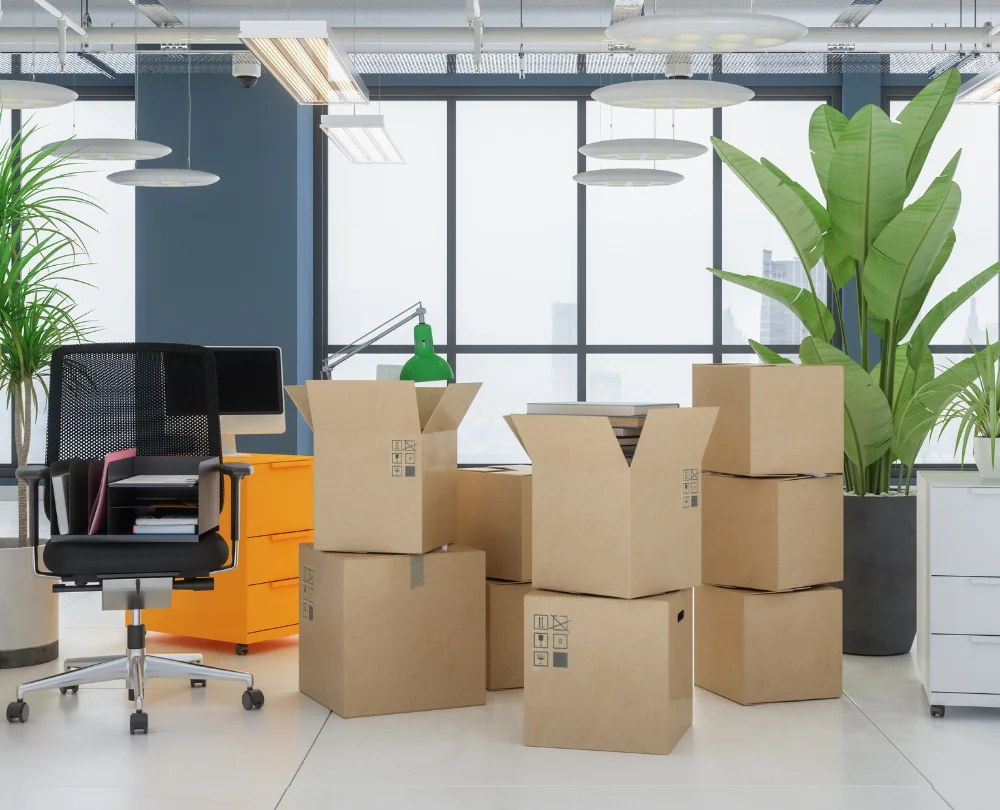 An image of lots of moving boxes in an office