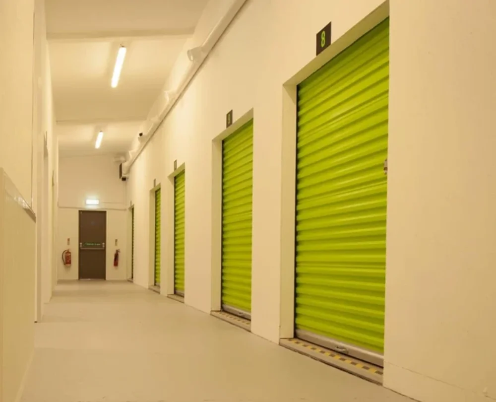 Image of secure storage containers with green doors