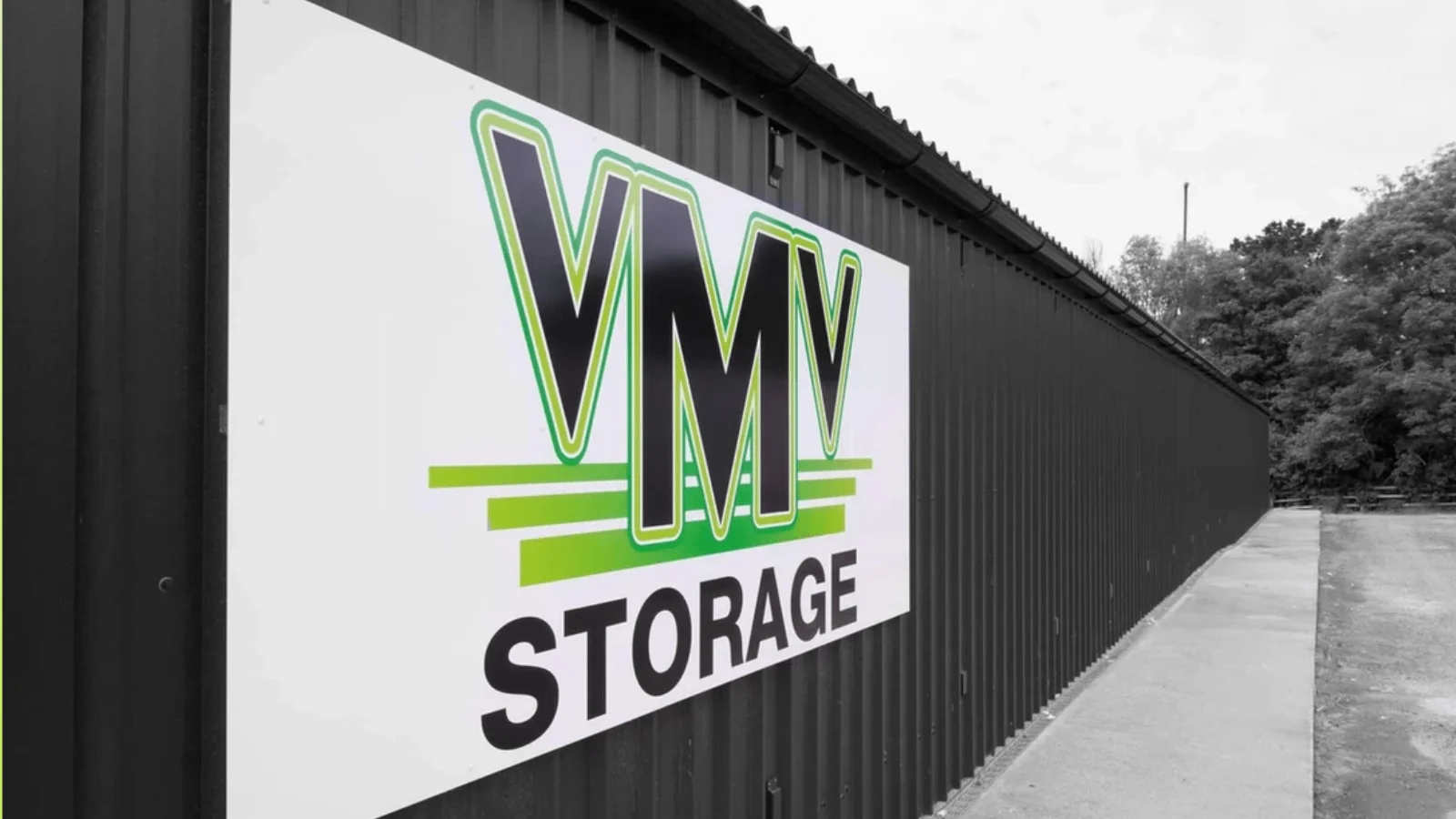Image of VMV Self Storage sign with logo.