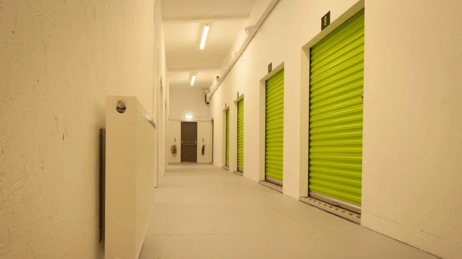 Image of self-storage unit with green doors
